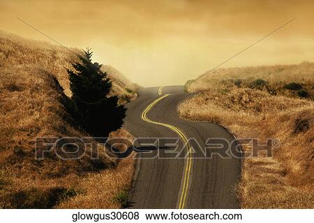 Road passing through a landscape View Large Photo Image Stock Photo - Road passing through a landscape. Fotosearch
