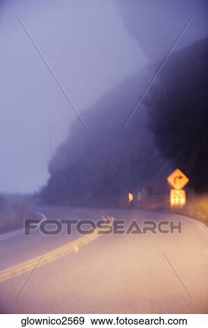 Road passing through a landscape View Large Photo Image Stock Photo - Road passing through a landscape. Fotosearch
