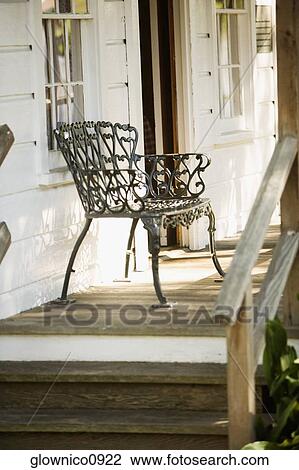 Side profile of a bench on a porch View Large Photo Image Stock Image - Side profile of a bench on a porch. Fotosearch
