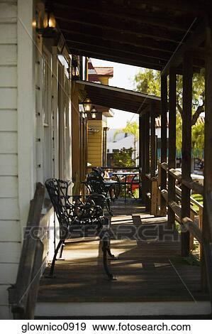 Side profile of a bench on a porch View Large Photo Image Stock Photo - Side profile of a bench on a porch. Fotosearch