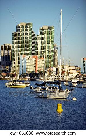 Side profile of yacht's docked at a harbor, San Diego Bay, California, USA View Large Photo Image Stock Image - Side profile of yacht's docked at a harbor, San Diego Bay, California, USA. Fotosearch