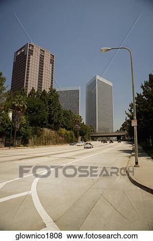Street leading to office buildings in a city, Sacramento, California, USA View Large Photo Image Stock Photo - Street leading to office buildings in a city, Sacramento, California, USA. Fotosearch