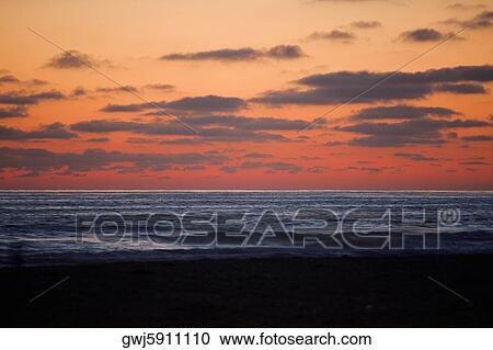 Sunset over a beach, San Diego, San Diego Bay, California, USA View Large Photo Image Stock Image - Sunset over a beach, San Diego, San Diego Bay, California, USA. Fotosearch
