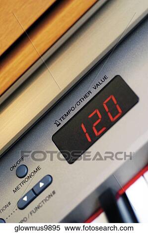 Stock Photography - Tempo digital read out and controls on electric piano. Fotosearch