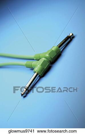 Two green cables with audio plugs, close-up View Large Photo Image Stock Image - Two green cables with audio plugs, close-up. Fotosearch