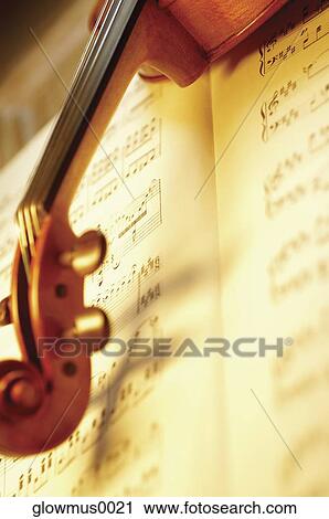 Stock Image - Violin and sheet music. Fotosearch