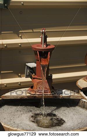 Water flowing through a water pump View Large Photo Image Stock Photo - Water flowing through a water pump. Fotosearch