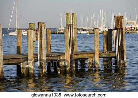 Wooden posts at a pier, Annapolis, Maryland, USA View Large Photo Image Stock Photography - Wooden posts at a pier, Annapolis, Maryland, USA. Fotosearch