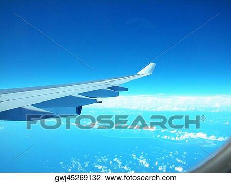 Airplane in flight View Large Photo Image Stock Image - Airplane in flight. Fotosearch