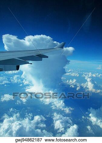 Airplane in flight View Large Photo Image Stock Photo - Airplane in flight. Fotosearch