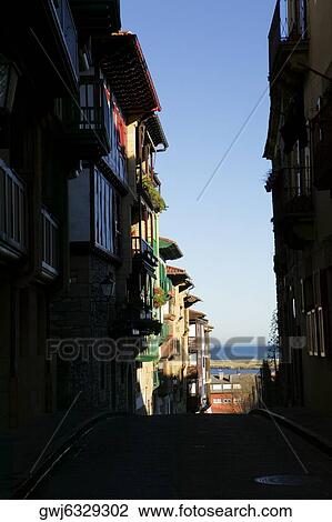 Alleyway through a town, Spain View Large Photo Image Stock Image - Alleyway through a town, Spain. Fotosearch