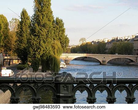Arch bridge on a river, Seine River, Paris, France View Large Photo Image Stock Image - Arch bridge on a river, Seine River, Paris, France. Fotosearch