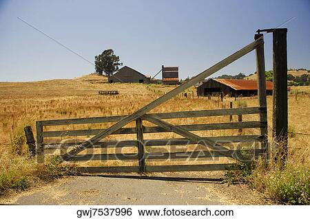 Barn in a field View Large Photo Image Stock Photograph - Barn in a field. Fotosearch