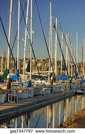 Boats at a harbor View Large Photo Image Stock Photo - Boats at a harbor. Fotosearch