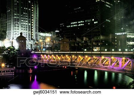 Bridge in a city lit up at night, Michigan Avenue Bridge, Chicago River, Chicago, Illinois, USA View Large Photo Image Stock Image - Bridge in a city lit up at night, Michigan Avenue Bridge, Chicago River, Chicago, Illinois, USA. Fotosearch