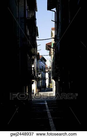 Building on the both side of an empty street, Spain View Large Photo Image Stock Photo - Building on the both side of an empty street, Spain. Fotosearch
