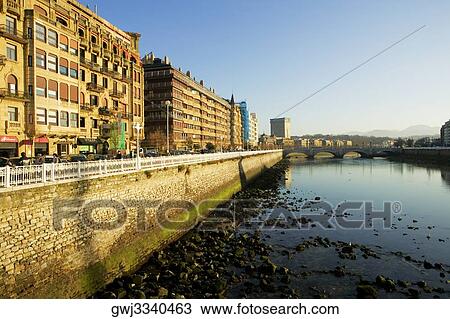 Buildings in a city by the river, Spain View Large Photo Image Stock Image - Buildings in a city by the river, Spain. Fotosearch