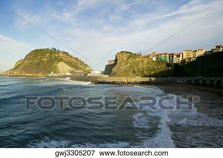 Buildings on a hill by the sea, Spain View Large Photo Image Stock Photo - Buildings on a hill by the sea, Spain. Fotosearch