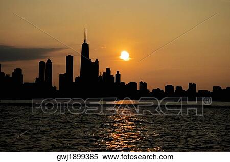 Buildings on a waterfront at sunset, Chicago, Illinois, USA View Large Photo Image Stock Photography - Buildings on a waterfront at sunset, Chicago, Illinois, USA. Fotosearch