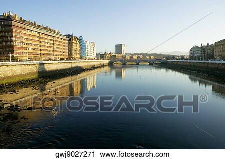 Buildings on the both sides of a river, Spain View Large Photo Image Stock Image - Buildings on the both sides of a river, Spain. Fotosearch