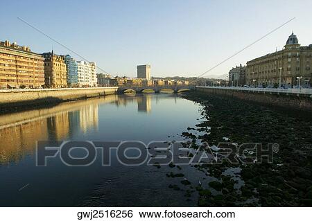 Buildings on the both sides of a river, Spain View Large Photo Image Stock Photograph - Buildings on the both sides of a river, Spain. Fotosearch