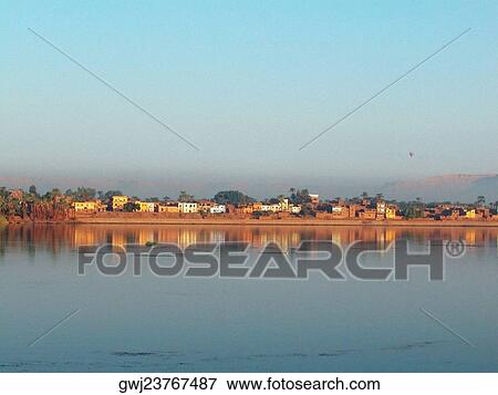 Stock Photo - Buildings on the waterfront, Nile River, Egypt. Fotosearch