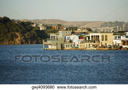Buildings on the waterfront View Large Photo Image Stock Image - Buildings on the waterfront. Fotosearch
