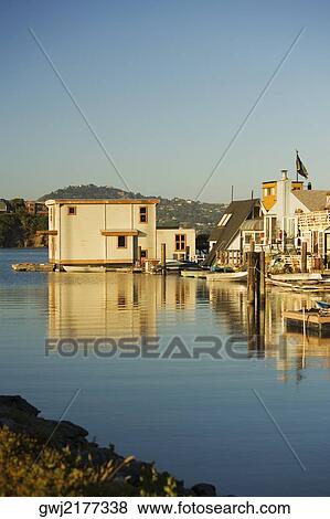 Buildings on the waterfront View Large Photo Image Stock Photo - Buildings on the waterfront. Fotosearch
