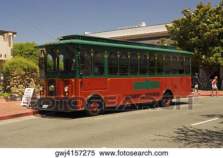 Bus parked on a roadside View Large Photo Image Stock Photography - Bus parked on a roadside. Fotosearch