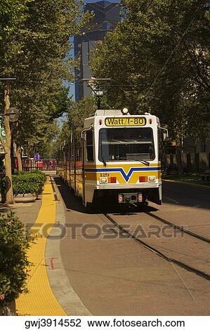 Cable car moving on a railroad track View Large Photo Image Stock Image - Cable car moving on a railroad track. Fotosearch