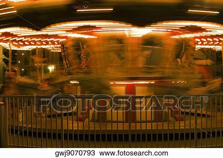 Carousel in an amusement park at night, San Diego, California, USA View Large Photo Image Stock Image - Carousel in an amusement park at night, San Diego, California, USA. Fotosearch