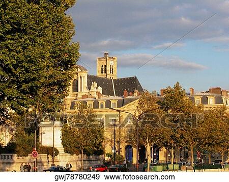 Stock Photo - Cars parked in front of a building, Paris, France. Fotosearch