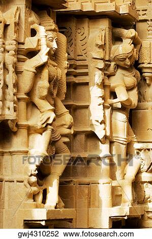Carved stone statue in a temple, Jaisalmer, Rajasthan, India View Large Photo Image Stock Image - Carved stone statue in a temple, Jaisalmer, Rajasthan, India. Fotosearch