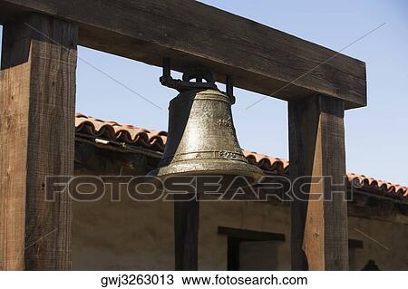 Close-up of a bell hanging in front of a house View Large Photo Image Stock Image - Close-up of a bell hanging in front of a house. Fotosearch