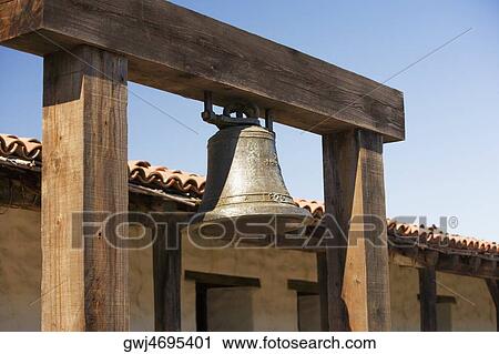 Close-up of a bell hanging in front of a house View Large Photo Image Stock Image - Close-up of a bell hanging in front of a house. Fotosearch