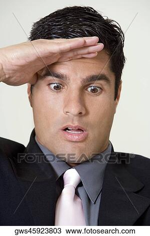 Close-up of a businessman saluting View Large Photo Image Stock Image - Close-up of a businessman saluting. Fotosearch