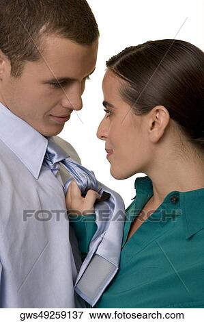Close-up of a businesswoman pulling a businessman's tie View Large Photo Image Stock Photo - Close-up of a businesswoman pulling a businessman's tie. Fotosearch