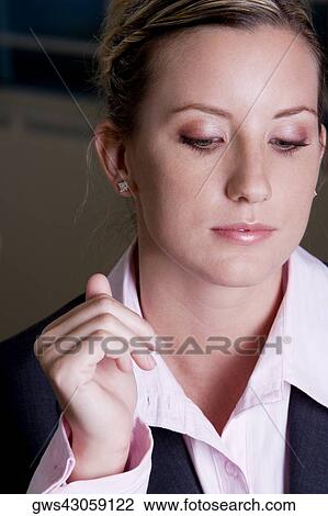 Close-up of a businesswoman thinking View Large Photo Image Stock Image - Close-up of a businesswoman thinking. Fotosearch