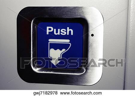 Close-up of a flush button in airplane bathroom View Large Photo Image Stock Photo - Close-up of a flush button in airplane bathroom. Fotosearch