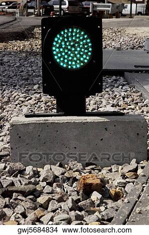 Close-up of a green light on the railroad tracks View Large Photo Image Picture - Close-up of a green light on the railroad tracks. Fotosearch