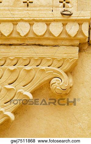 Close-up of carved wall of a palace, Rajmahal, Jaisalmer, Rajasthan, India View Large Photo Image Stock Photo - Close-up of carved wall of a palace, Rajmahal, Jaisalmer, Rajasthan, India. Fotosearch