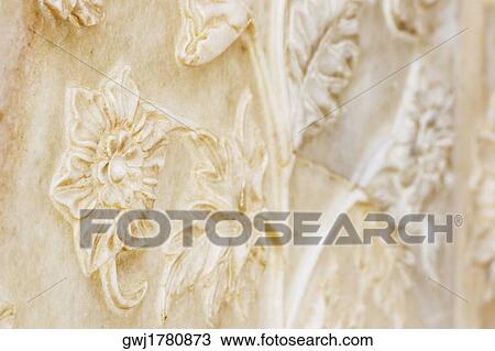 Stock Image - Close-up of carvings on the wall, Taj Mahal, Agra, Uttar Pradesh, India. Fotosearch