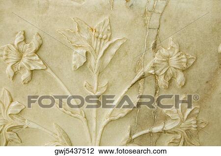 Stock Image - Close-up of carvings on the wall, Taj Mahal, Agra, Uttar Pradesh, India. Fotosearch