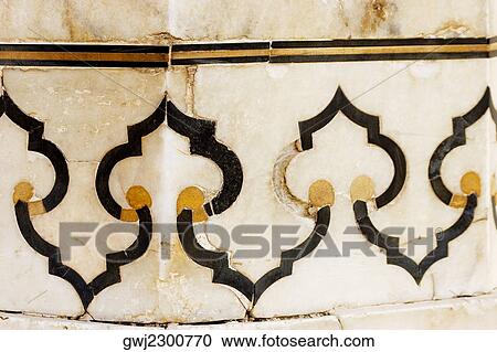 Stock Image - Close-up of marble inlay on the wall, Taj Mahal, Agra, Uttar Pradesh, India. Fotosearch