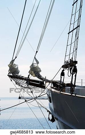 Stock Image - Close-up of the bow of a yacht moored at a harbor. Fotosearch