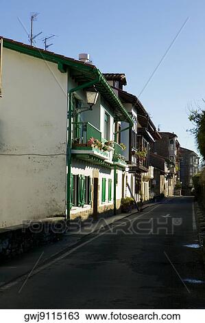 Empty street in front of residential buildings, Spain View Large Photo Image Stock Image - Empty street in front of residential buildings, Spain. Fotosearch