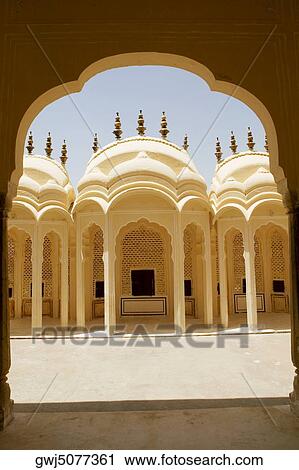 Facade of a palace seen through an arched corridor, City Palace, Jaipur, Rajasthan, India View Large Photo Image Stock Image - Facade of a palace seen through an arched corridor, City Palace, Jaipur, Rajasthan, India. Fotosearch