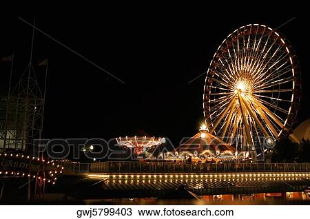 Ferris wheel lit up at night, Navy Pier Park, Chicago, Illinois, USA View Large Photo Image Stock Image - Ferris wheel lit up at night, Navy Pier Park, Chicago, Illinois, USA. Fotosearch