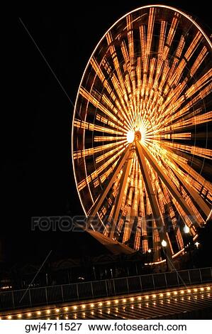 Ferris wheel lit up at night, Navy Pier Park, Chicago, Illinois, USA View Large Photo Image Stock Photo - Ferris wheel lit up at night, Navy Pier Park, Chicago, Illinois, USA. Fotosearch
