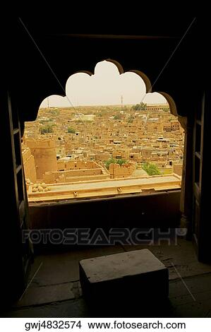 Fort seen through a window, Jaisalmer, Rajasthan, India View Large Photo Image Picture - Fort seen through a window, Jaisalmer, Rajasthan, India. Fotosearch